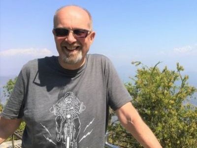 Chris Cammidge Cycling on the  tour with redspokes